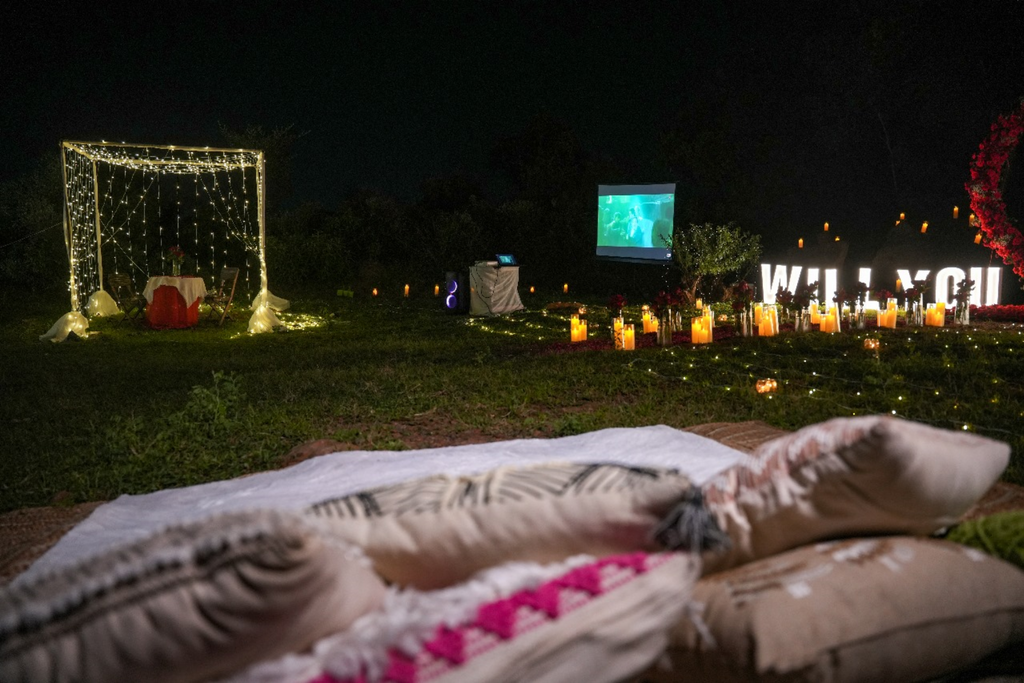 Romantic Movie Night Proposal With Waterfall View